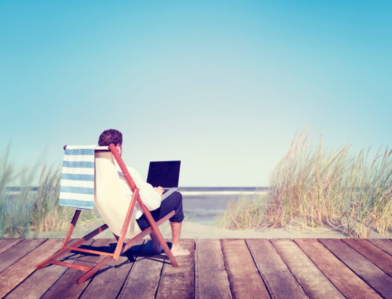 Businessman Working by the Beach