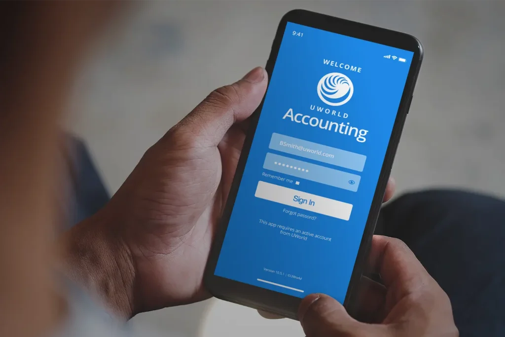 UWorld Accounting - Exam Prep mobile app home screen on a mobile device held by a CMA candidate