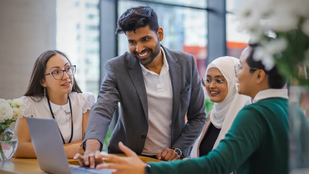 CPA and CMA candidates smiling in building lobby