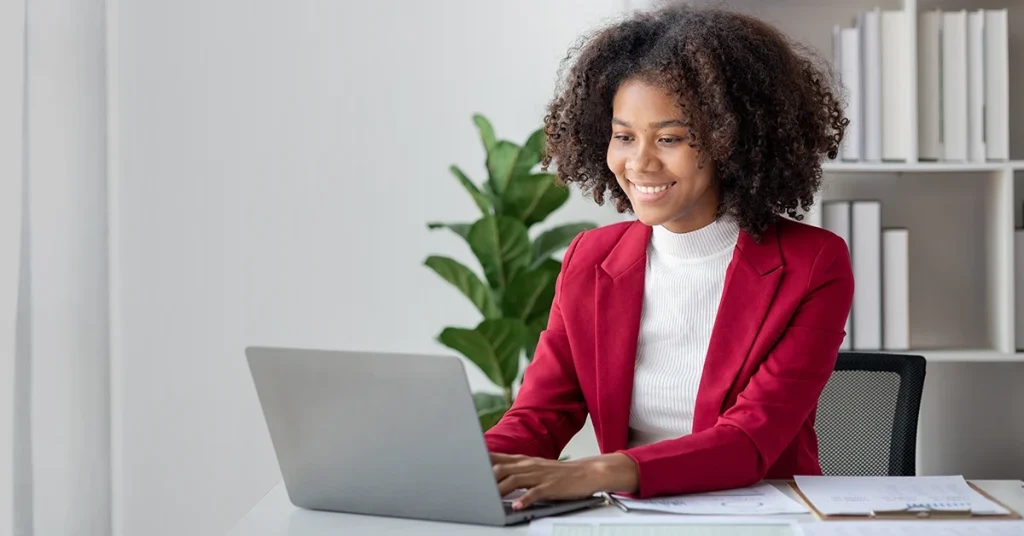 CPA candidate using the best AUD CPA review on a laptop