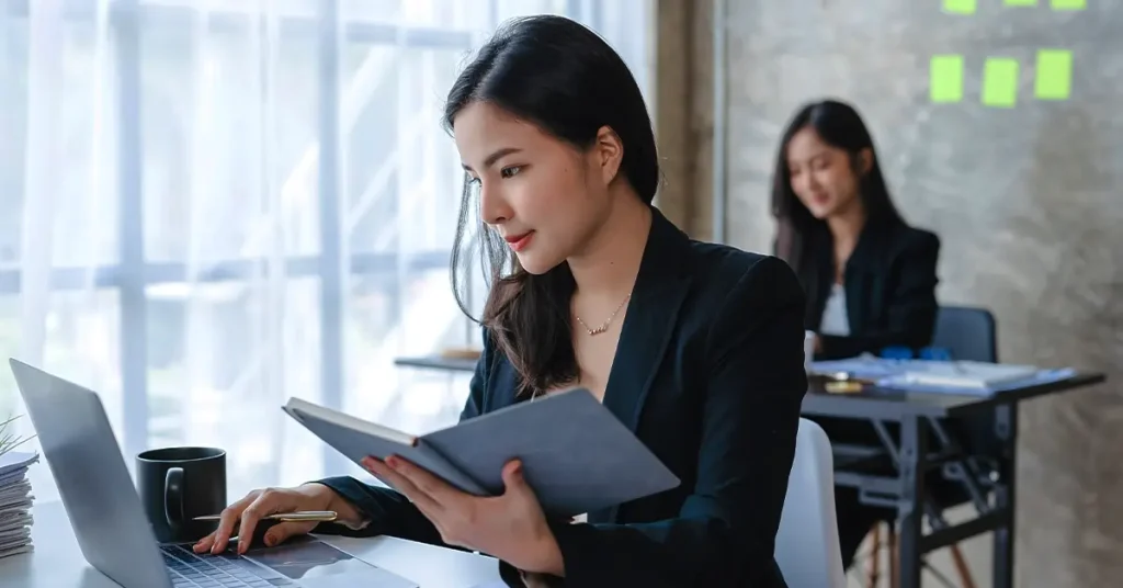 Professionals studying with laptops using the best adaptive learning CPA review course